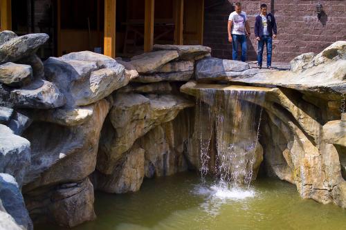 Какие стили и дизайны можно реализовать с помощью арт-бетона. Ландшафт с применением объектов из артбетона