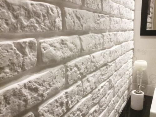 Отделка стен панелями под кирпич. Способы отделки помещения стеновыми панелями под кирпич