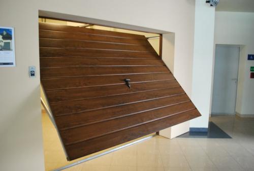 Секционные гаражные ворота в Леруа. Подъемные гаражные ворота в Леруа Мерлен