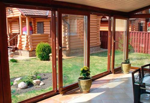 Как построить Веранду к дому своими руками из дерева. Веранда пристроенная к дому: этапы строительства 12