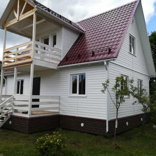 Выбор фасадных панелей с утеплителем для наружной отделки дома 27