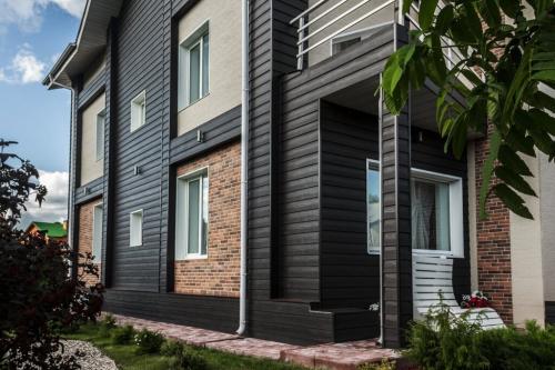 Отделочные панели: современный способ обновления фасада частного дома 17